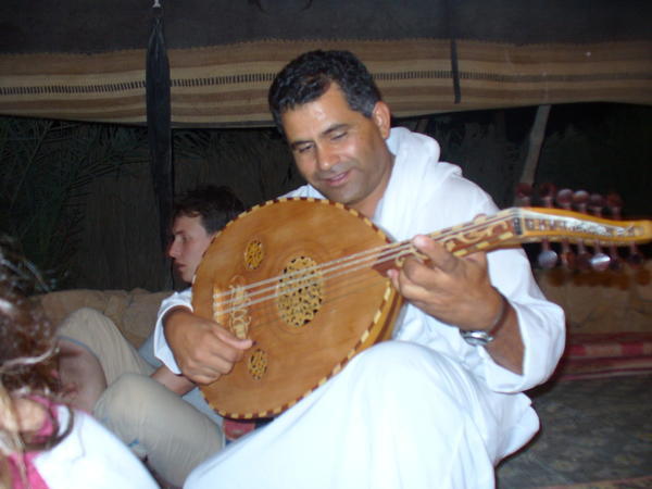 Bedouin host and his instrument