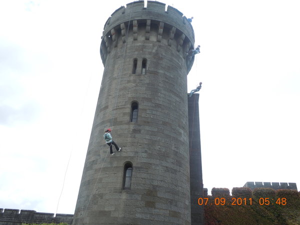 Abseiling down the tower wall at Penrhyn Castle