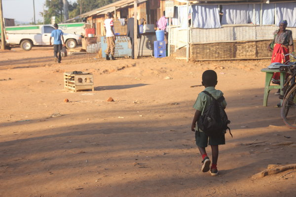 Boy walking through Neno