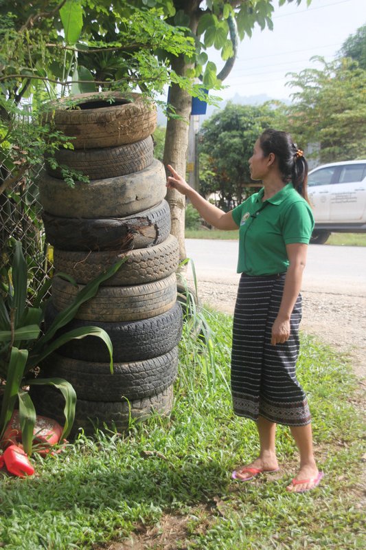 Stacking tires to prevent dengue