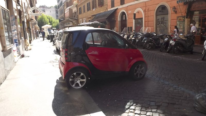 Smart cars are everywhere here & park in any direction!