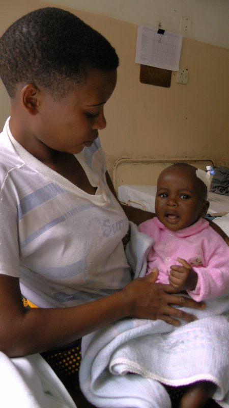 Mother & Child In Malaria Room