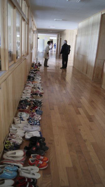 Fukiko walked down teh school hallways with the principal