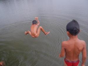 Swimmning in the lake in front of Angkor Wat