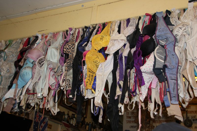 Daly Waters Pub - bras hung up over the bar