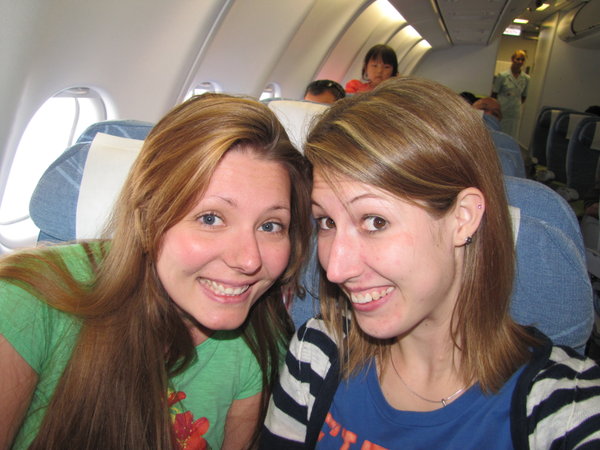 Lizzie and I on our flight from Finland to Beijing 