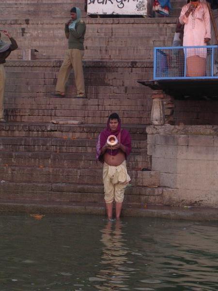 Making an offering to the Ganges, Varanasi