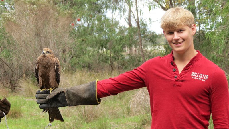 Michael holding a Raptor at Eagles Heritage
