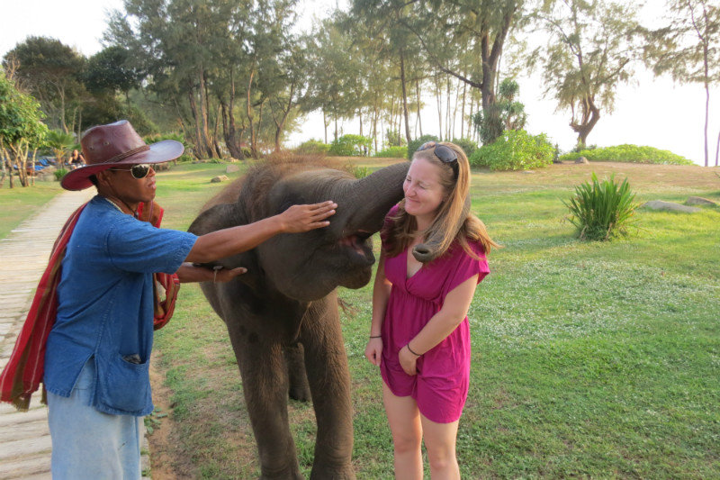 Jenny being loved on by the hotel elephant