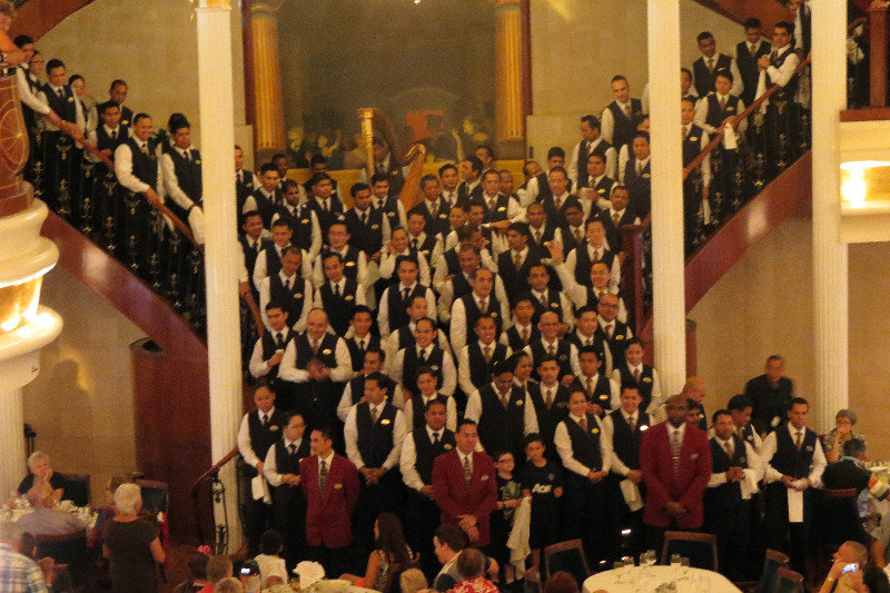 Dining Room waiters together, singing a final song for us