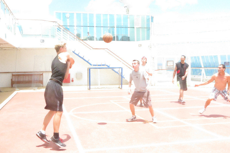 Michael and Brian Guo playing basketball