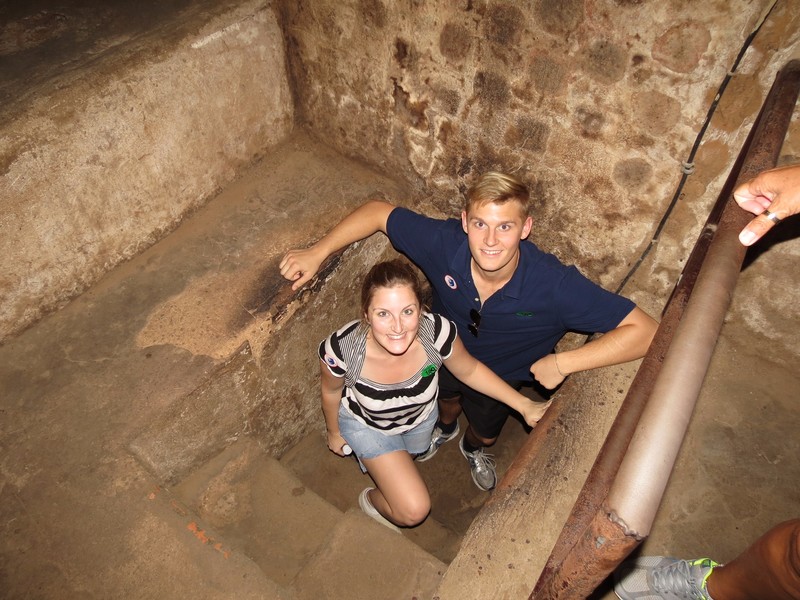 Jenny and Michael entering the lower level of the Củ Chi tunnels