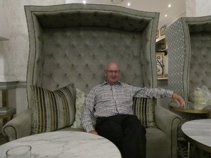 Relaxing in a serious chair at our hotel in Johannesburg