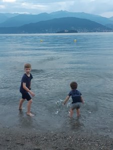 Liam and Oliver playing in the fresh water of Lake Maj