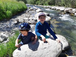 Liam and Oliver spent lots of time throwing rocks into the river at Livignio