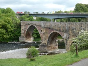 The beautiful old Drygrange carriage and cart bridge near the Leaderfoot Viaduct over the River Tweed