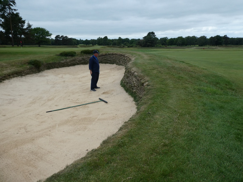P1180069 GG hitting out of fairway bunker on 13th hole