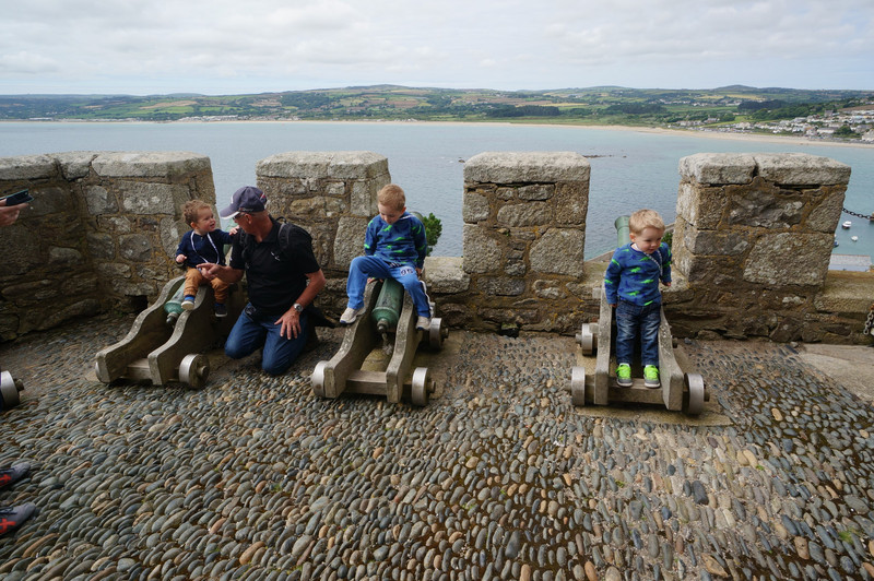 The boys on the canons at St Michaels Mont Cornwall