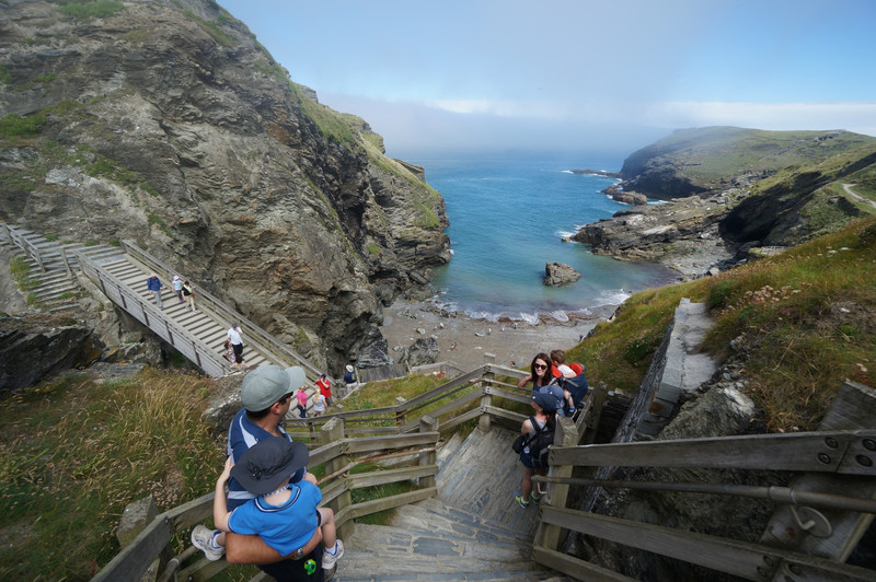 The family walking down the stairs to Tintagel Beach