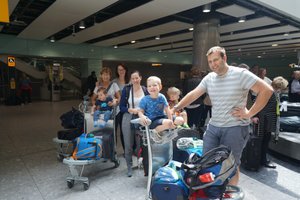 The families arrive at Heathrow - waiting for the maxi taxi service