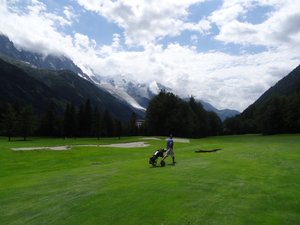 Lush green fairways looking straight at Mont Blanc and the glacier