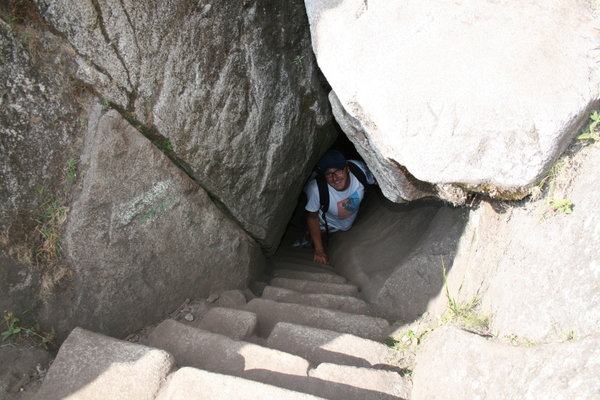 Climbing through a cave