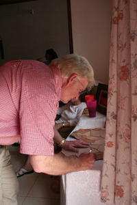 Ralph Williams signing the Guest Map