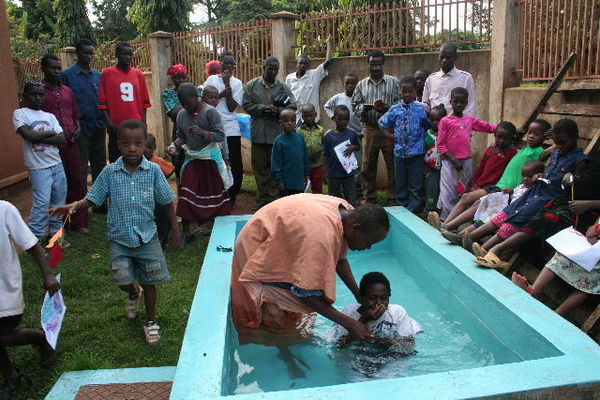 Tumaini being Baptized