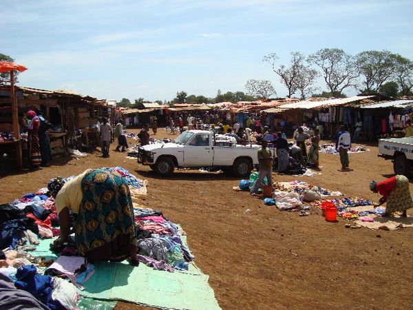 the trucks bringing in the bundles of clothing