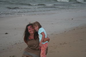 Mom & Gracie walking the beach and hunting for shells....