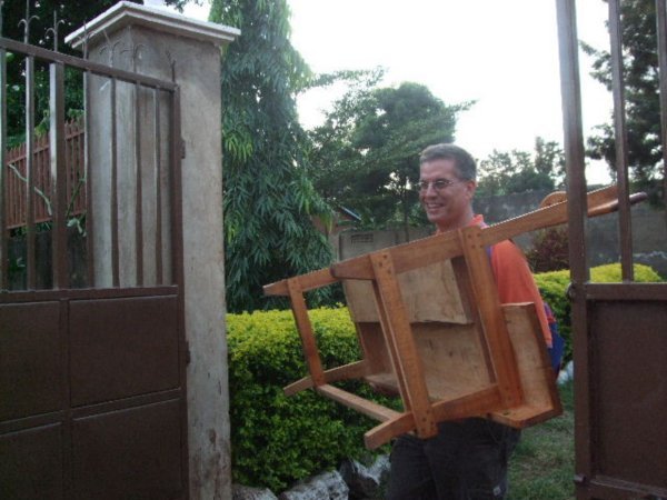 Ralph, Carrying one last bench to the building