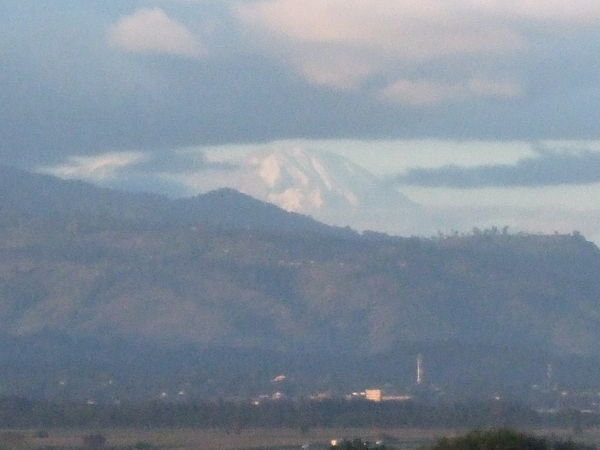 Mt Meru with Mt. Kilimanjaro in the Distance
