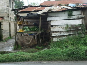 A typical fruit stand and home all in one