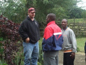 Brent visiting with brethren at Arusha