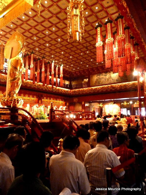 inside the chinese buddhist temple - watching monks give alms
