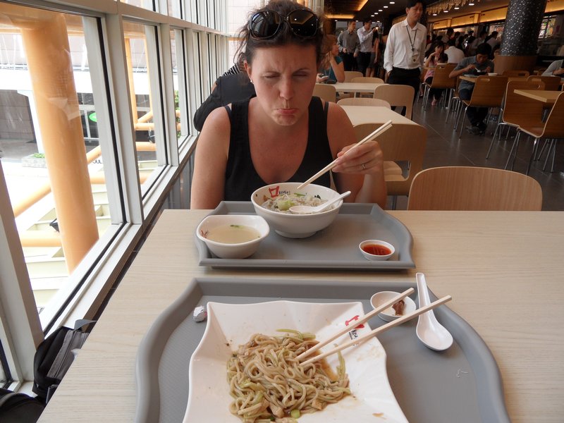 Jen struggling with chopsticks
