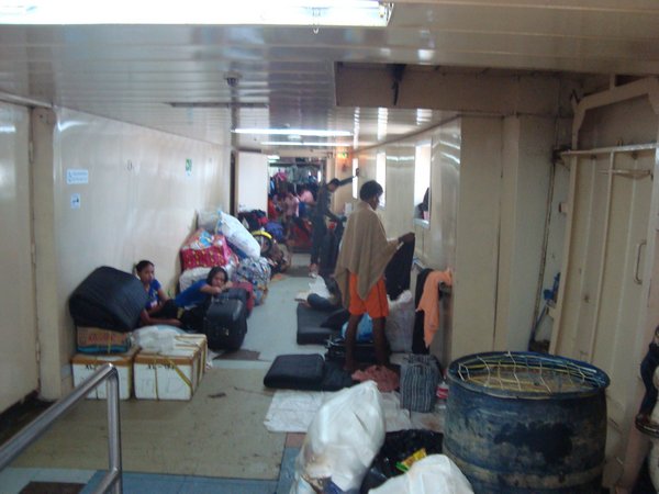 Indonesians sleeping in the corridors