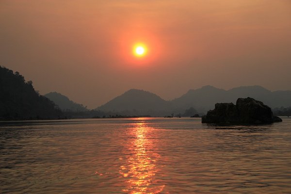 Cruising into the sun  - Southern Laos
