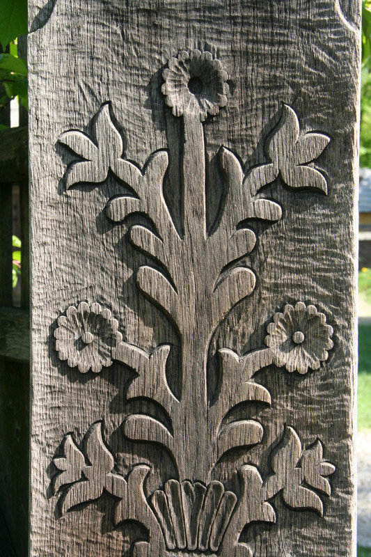 Carving in one of the gates at the Village