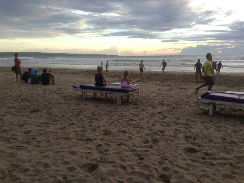 Kids relaxing on legian Beach