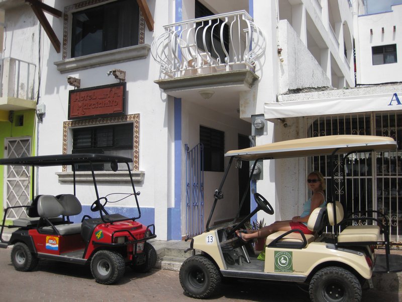 Our Golf buggy outside our hotel (means litttle martian!)