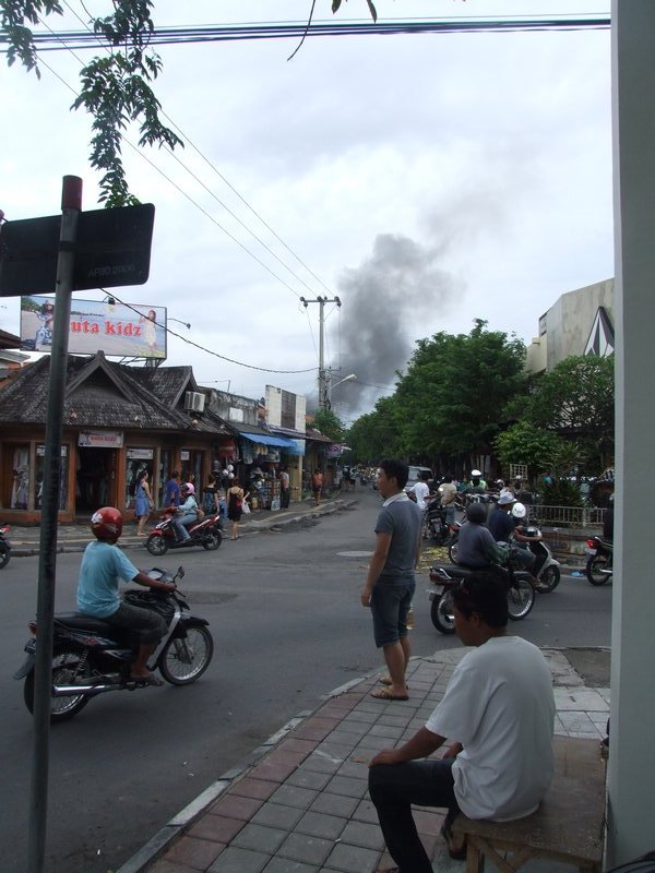 shops on fire at kuta street