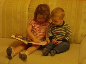 Isabelle reading to Myles.