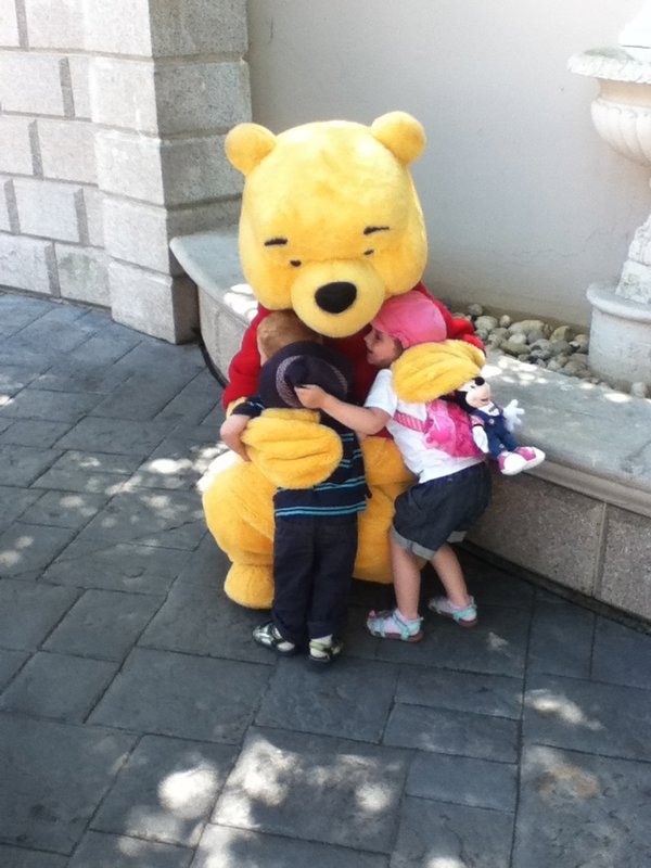 Hugging Pooh.