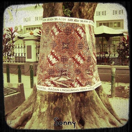 Batik ornament on tree in Malioboro also got dirty because of ash