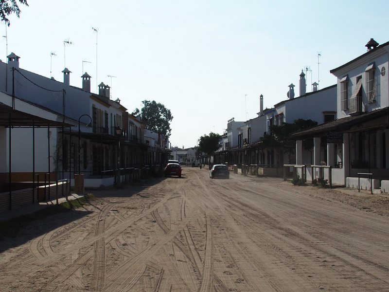 El Rocio and its sandy street with hitching posts