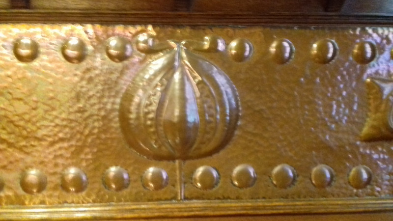 Copperwork detailing from an Arts and Crafts cupboard 