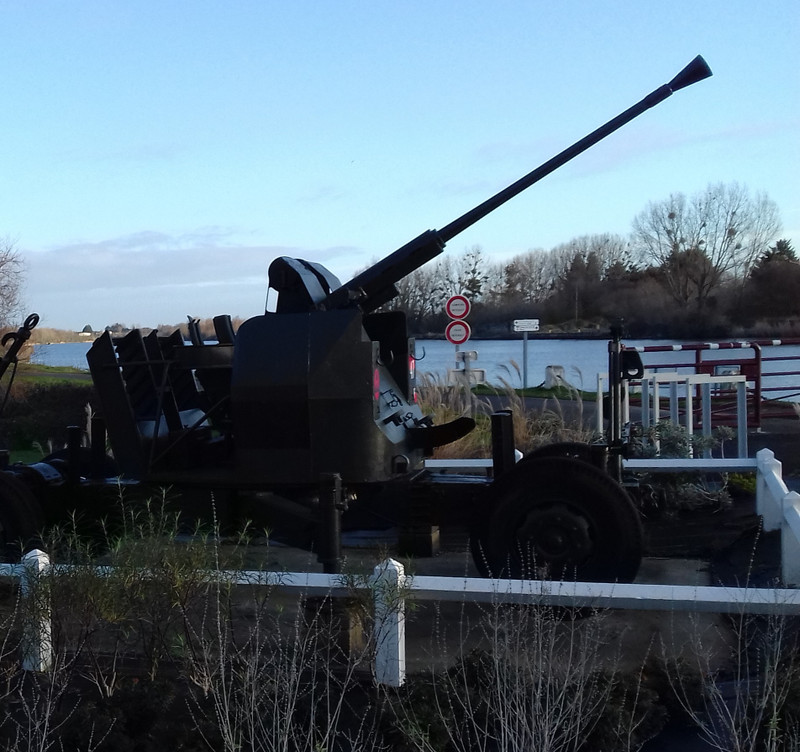 one of the guns pointing at the canal 