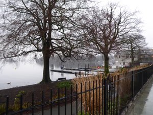 A dull and misty Lake Windermere at Bowness 
