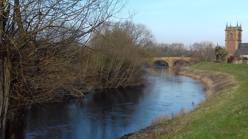 Another view of the Dee, the medieval bridge and the church tower